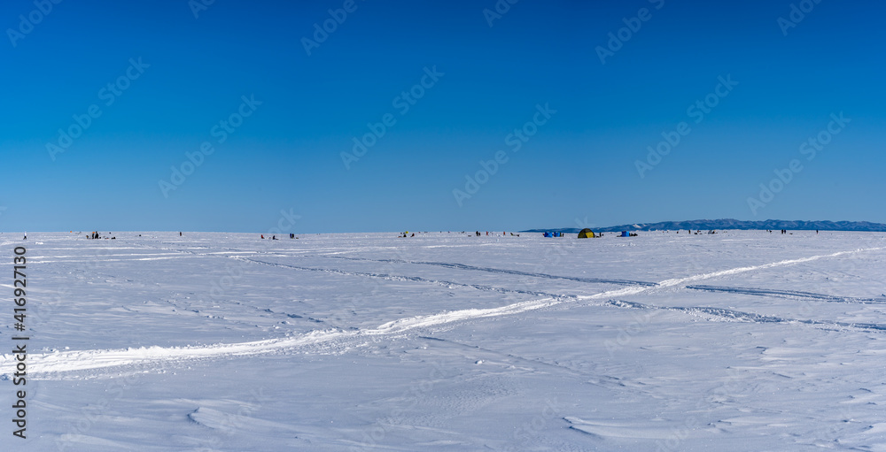 Winter sea covered with ice. Panorama