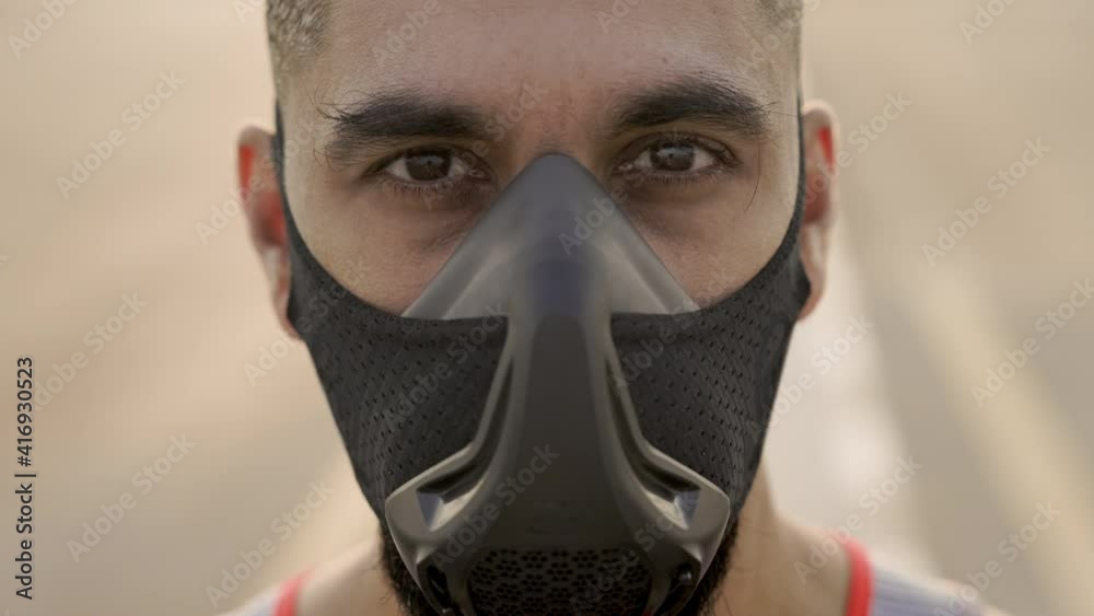 Young Asian Man In Black Mask To Protect Against Viral Infection. Concept Of Health Protection In Pandemic Viral Infection. Young Asian Man In Black Mask To Protect Against Viral Infection. Concept Of Health Protection In Pandemic Viral Infection.