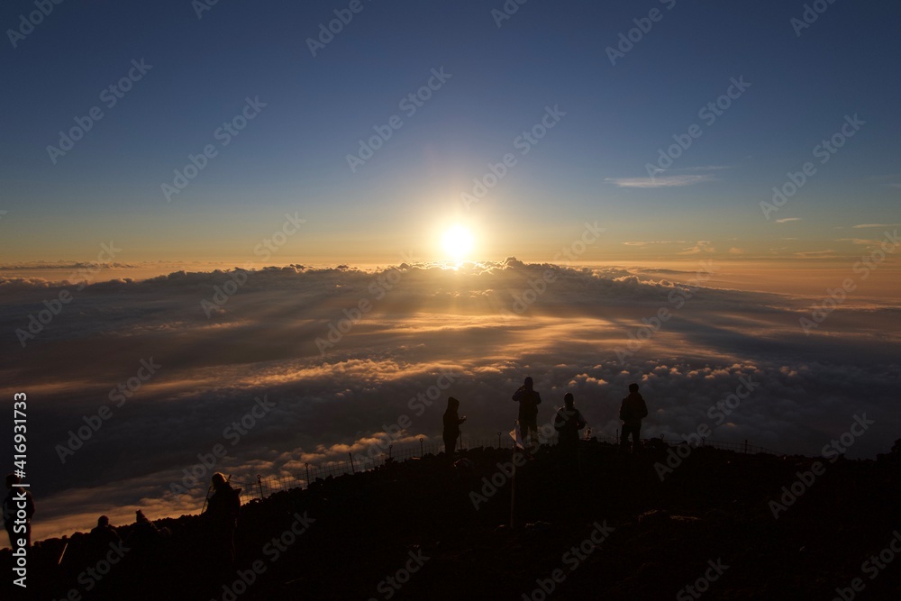 Fototapeta premium Sunrise at the top of Mt. Fuji