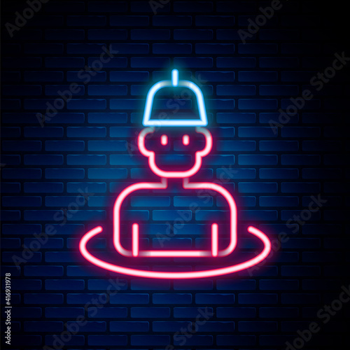 Glowing neon line Man in the sauna icon isolated on brick wall background. Colorful outline concept. Vector.