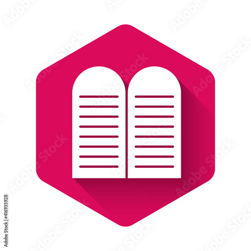 White The commandments icon isolated with long shadow background. Gods law concept. Pink hexagon button. Vector.
