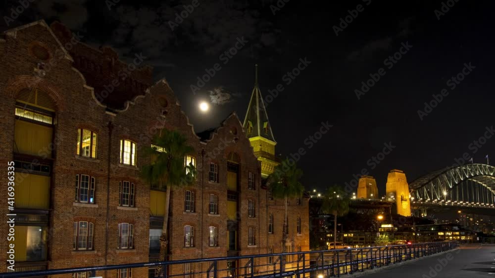 moon set over a historic building with a view of the old town moon set over a historic building with a view of the old town