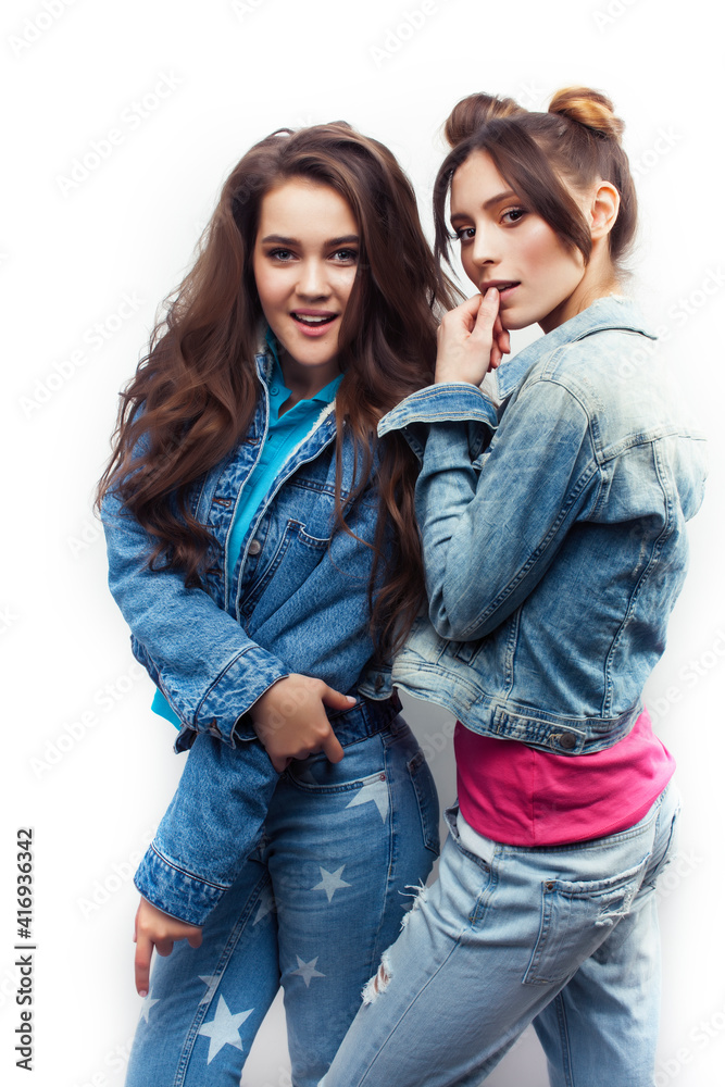 lifestyle and people concept: Fashion portrait of two stylish sexy girls best friends, over white background. Happy time for fun lifestyle and people concept: Fashion portrait of two stylish sexy girls best friends, over white background. Happy time for fun
