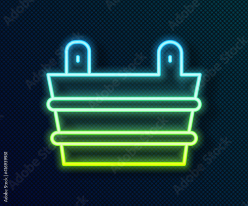 Glowing neon line Sauna bucket icon isolated on black background. Vector.