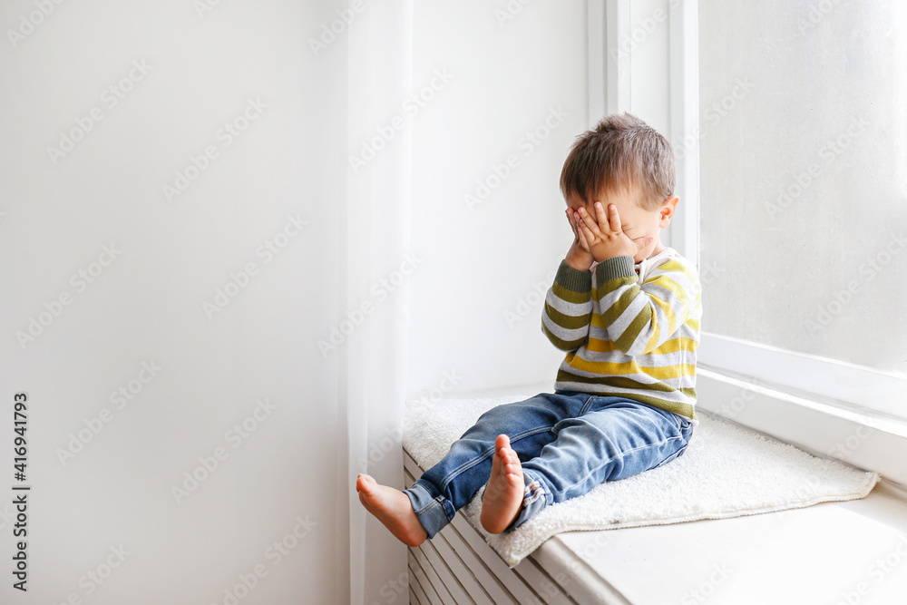 Little Smiling Boy Sitting Barefoot, Isolated On White Stock Photo, Picture  and Royalty Free Image. Image 6207823.