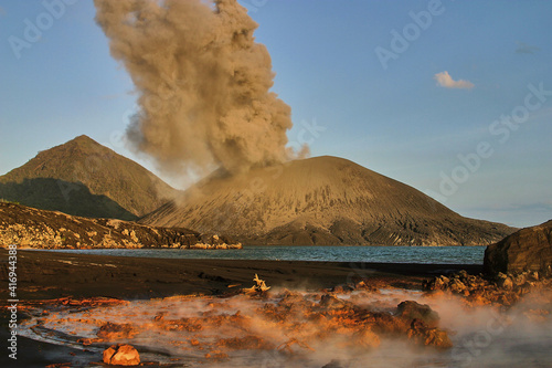 active volcano Tavurvur, Papua New Guinea, steaming water photo