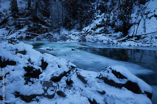 snow covered river bed winter