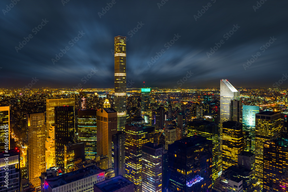 Fototapeta premium Aerial view night panorama of New York City downtown with urban skyscrapers