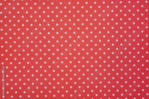 Abstract red and white paper background with dots