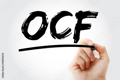 OCF - Operating Cash Flow acronym with marker, business concept background photo