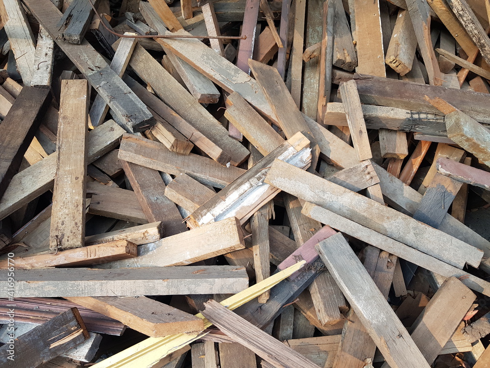 A pile of logs from dismantling the house. A pile of logs from dismantling the house.