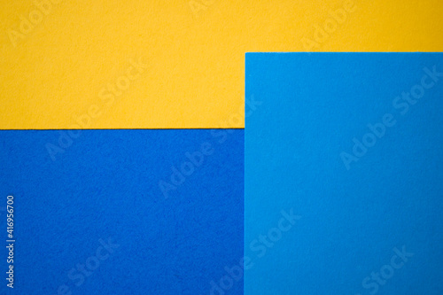 Blue and yellow abstract colored paper textured background, template, greeting card, book cover