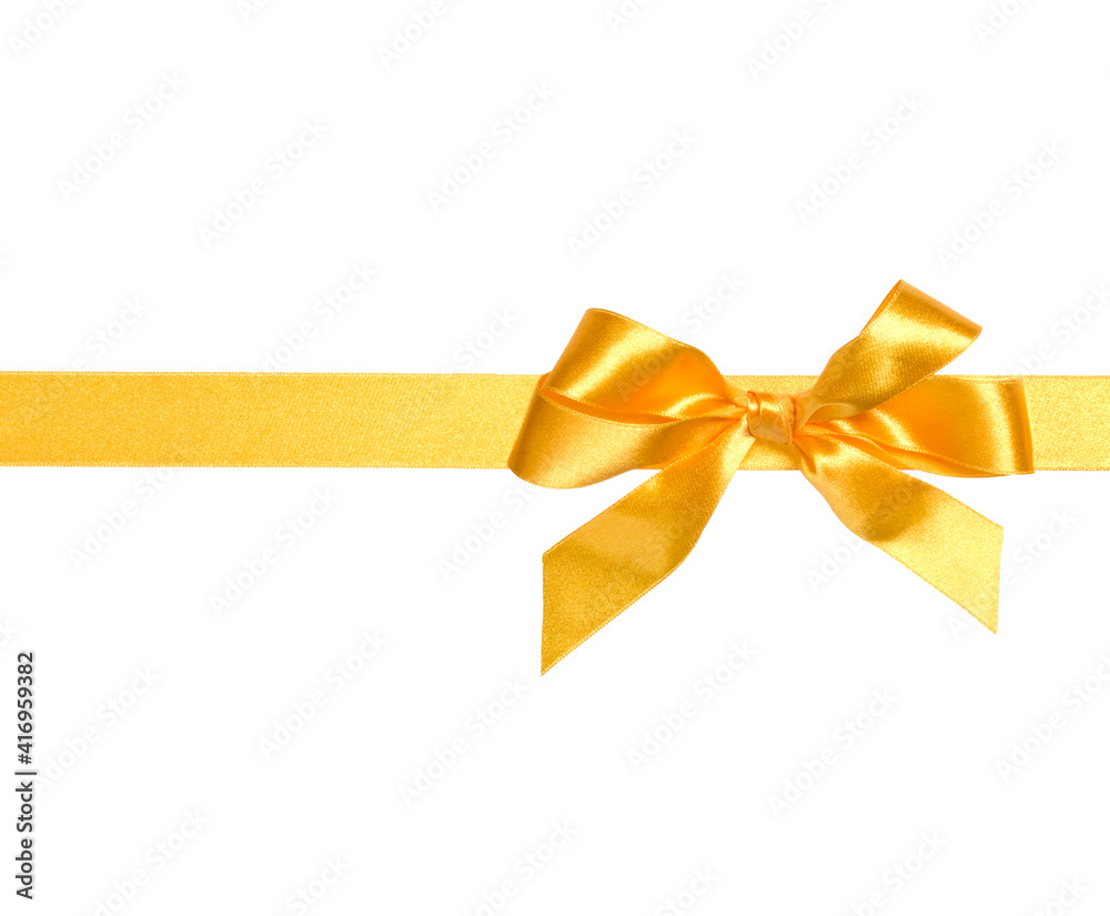 Festive golden gift ribbon and bow isolated on white background cutout Festive golden gift ribbon and bow isolated on white background cutout