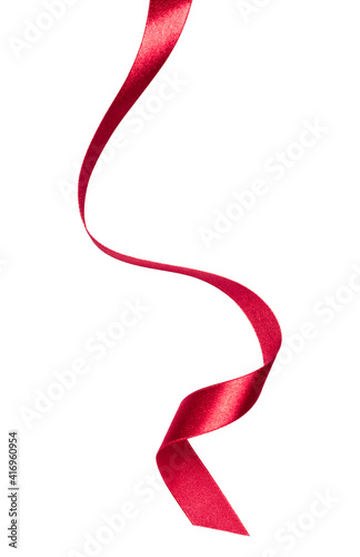 Shiny satin ribbon in red color isolated on white background close up