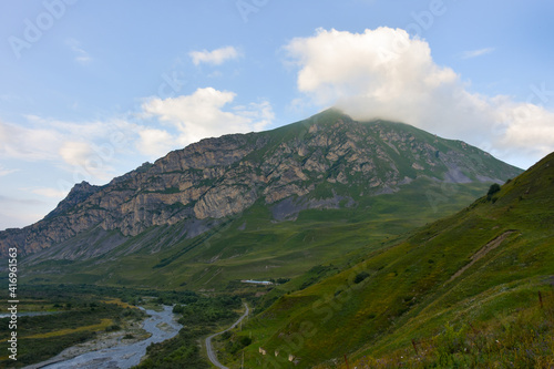 Large and small rivers and waterfalls in North Ossetia against the backdrop of majestic mountains. Republic of North Ossetia - Alania