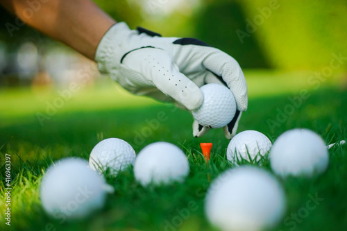 golf ball in hand