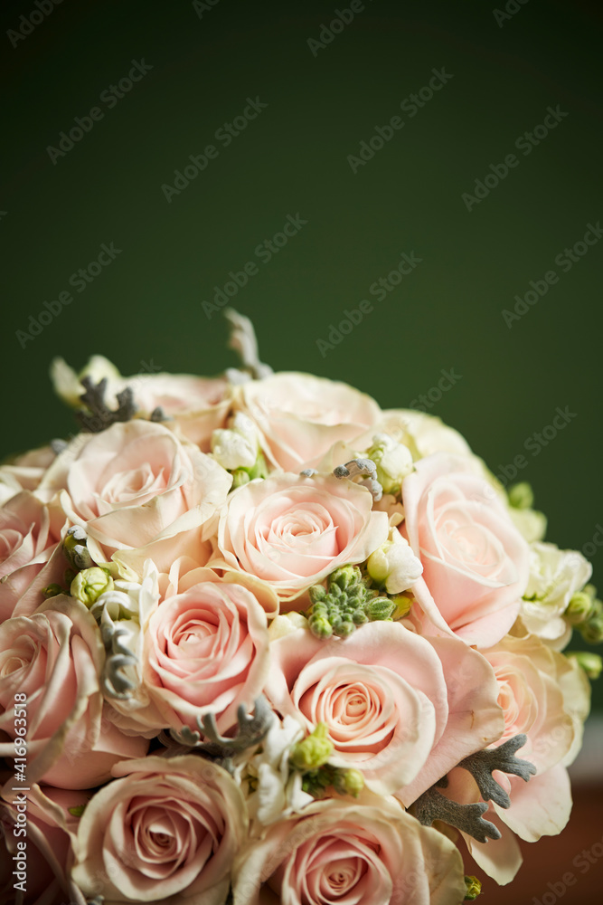 Wedding bouquet of flowers on a dark background
