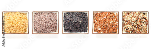 Dry organic rice seeds in ceramic bowl on white background