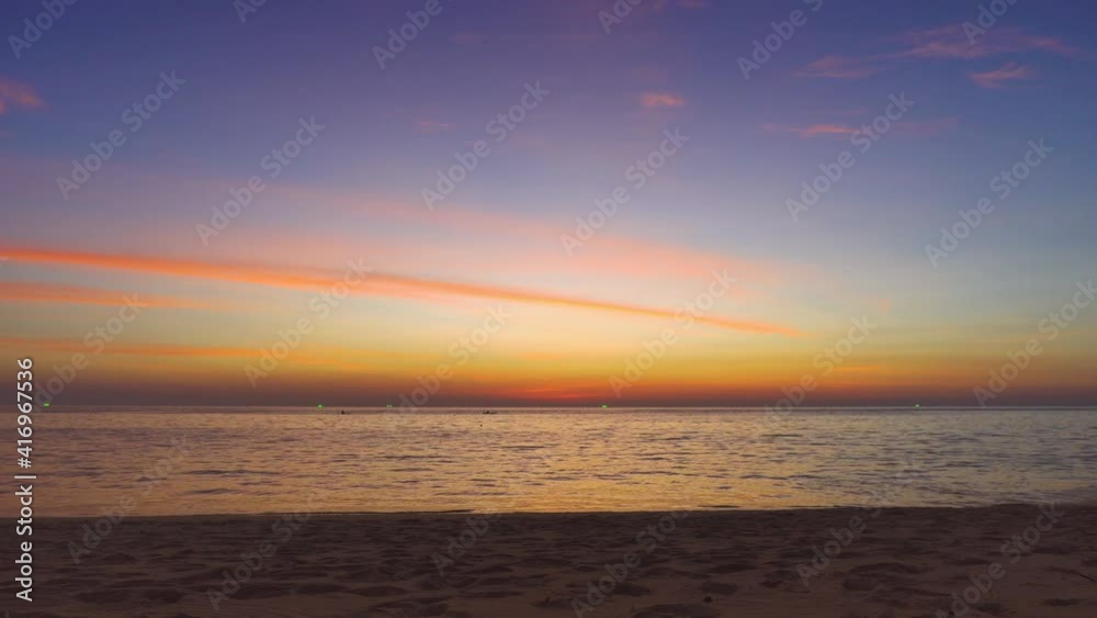 4k Scene of sunset tropical beach sea. New normal after covid-19. Phuket Thailand beautiful tropical beach with sunset sky. Beautiful Phuket beach is famous tourist destination at Andaman sea summer 4k Scene of sunset tropical beach sea. New normal after covid-19. Phuket Thailand beautiful tropical beach with sunset sky. Beautiful Phuket beach is famous tourist destination at Andaman sea summer
