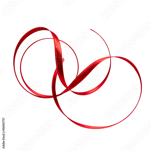 Shiny satin ribbon in red color isolated on white background close up .Ribbon image for decoration design.