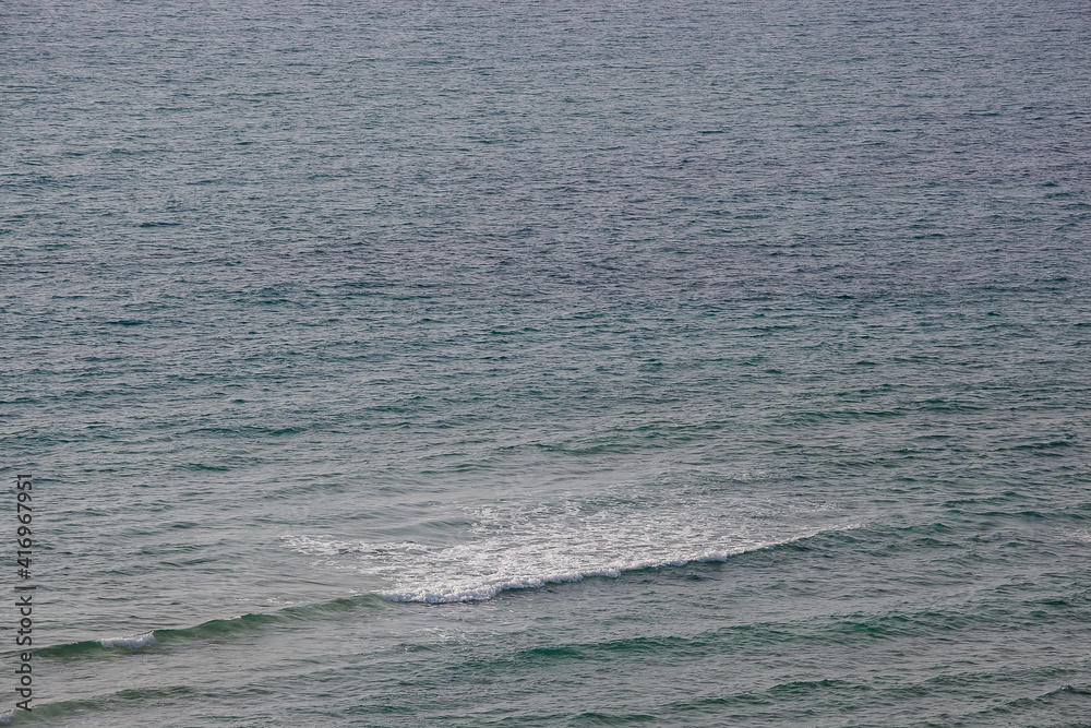 Fototapeta premium Waves in the Mediterranean, calm evening sea, minimalism, wave close-up