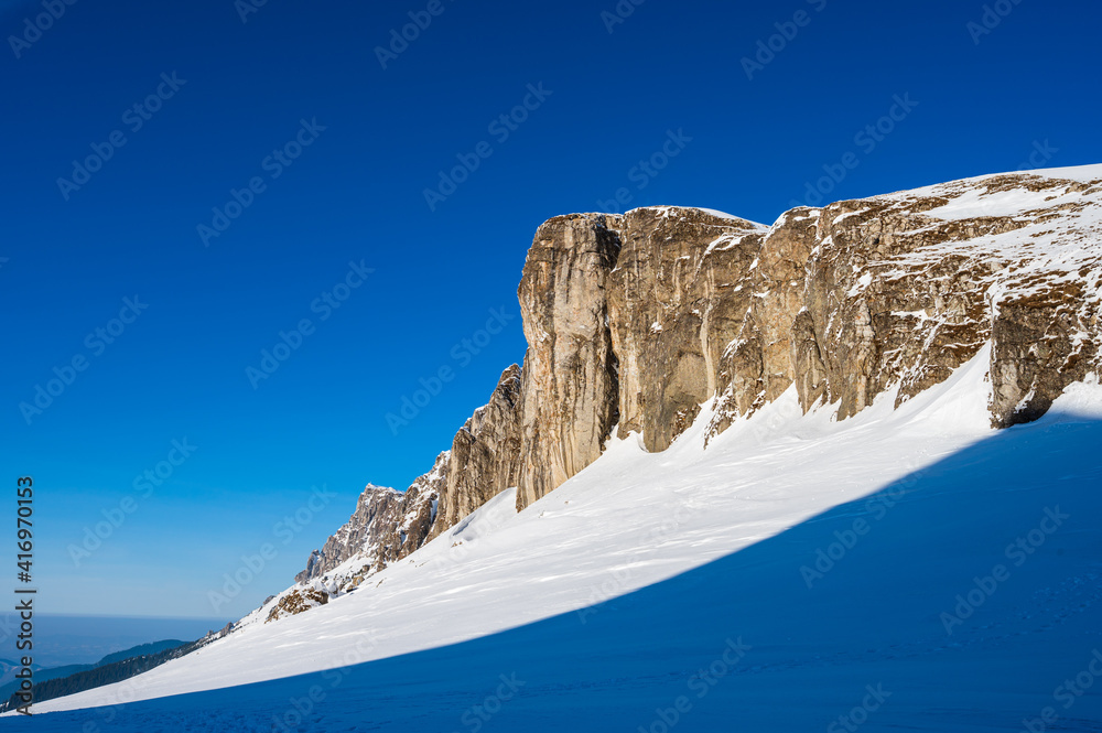 Snowy rocks in the Romanian Carpathians in winter