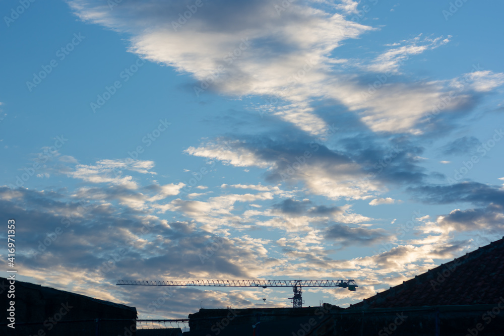 blue morning sky with dramatic clouds