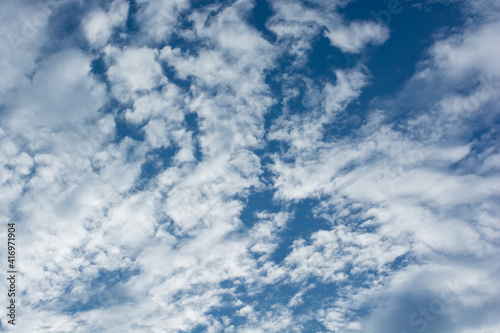 blue morning sky with dramatic clouds