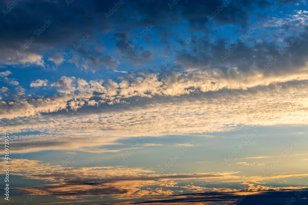 Beautiful evening sky with clouds at sunset. Beautiful evening sky with clouds at sunset.
