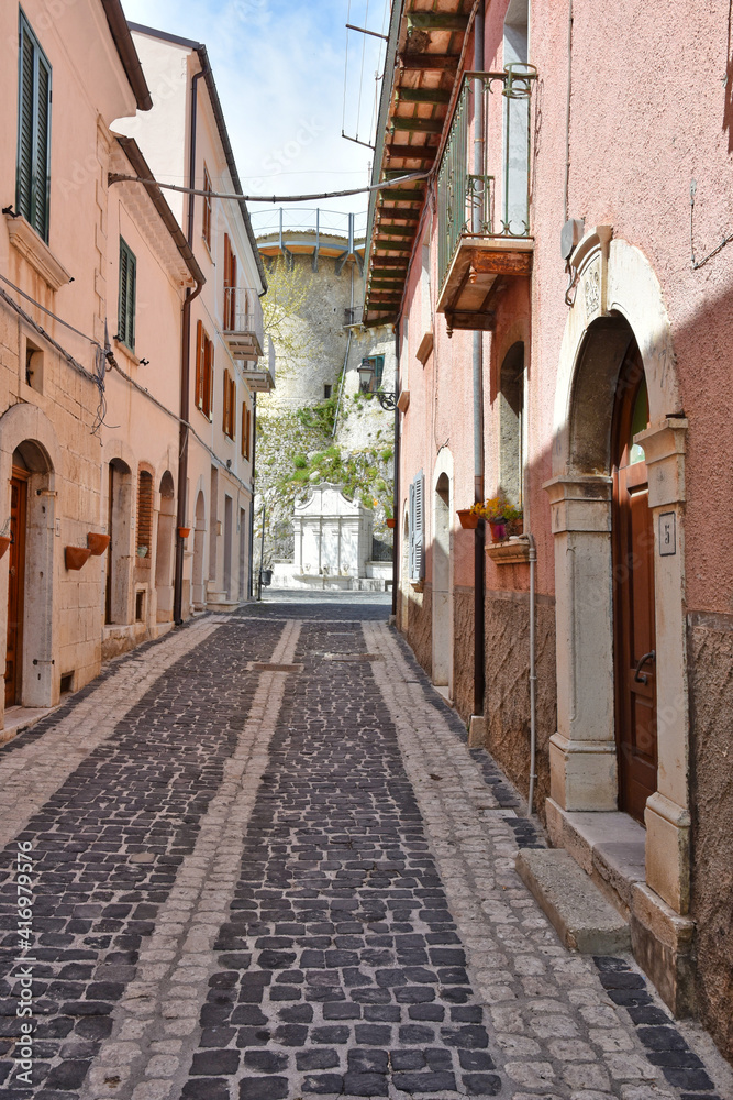 Fototapeta A narrow street in Macchiagodena, an old town in the Molise region, Italy.