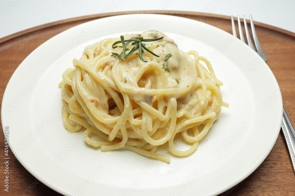 Carbonara spaghetti on a wood tray