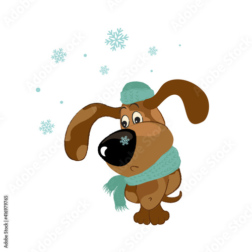 A sad dog in a scarf and a hat with a snowflake on his nose looks down.