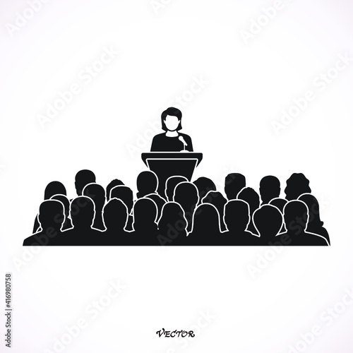 Speaker woman at conference and presentation. Audience at the conference hall