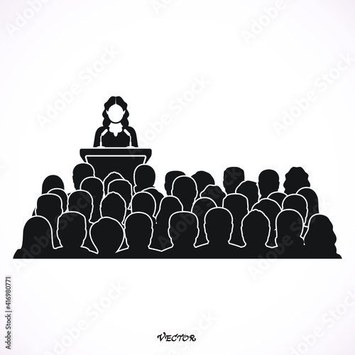 Speaker woman at conference and presentation. Audience at the conference hall