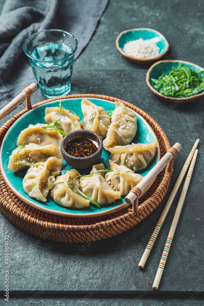 Asian Potstickers dumplings Gyoza with Soy Sauce
