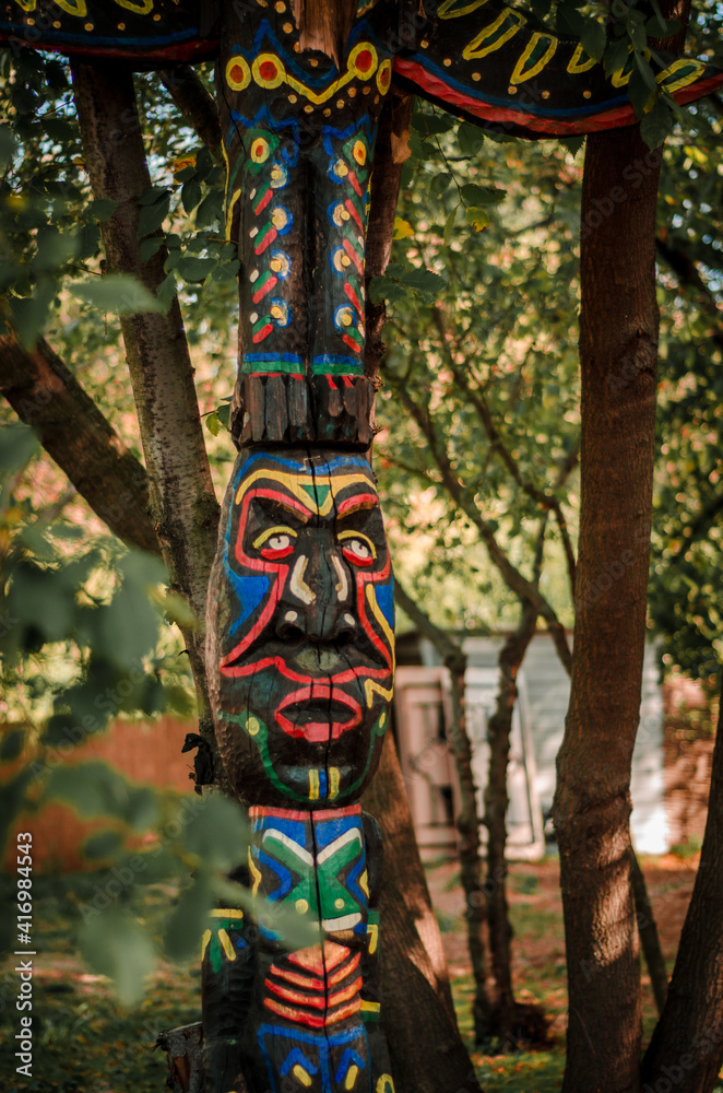 An old wooden statue of one of the old gods An old wooden statue of one of the old gods