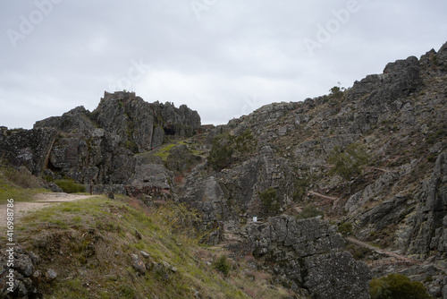 Penha Garcia historic village landscape of Pego river beach full of rocks and trees, in Portugal