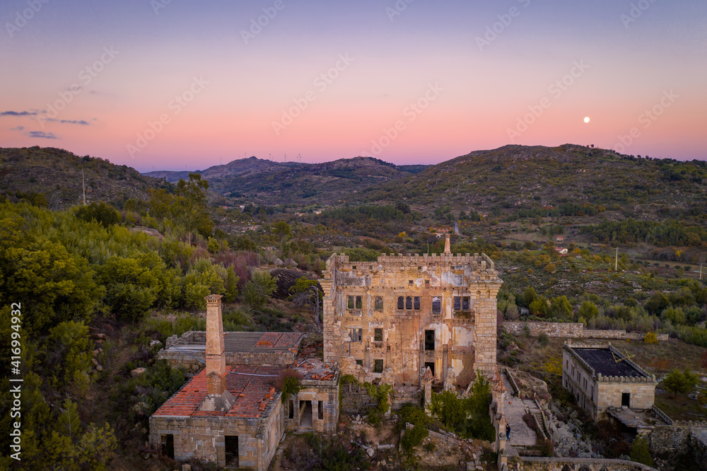 Obraz premium Drone aerial panorama of Termas Radium Hotel Serra da Pena at sunset in Sortelha, Portugal
