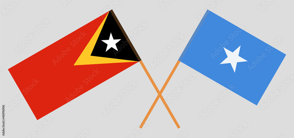 Crossed flags of East Timor and Somalia. Official colors. Correct proportion Crossed flags of East Timor and Somalia. Official colors. Correct proportion