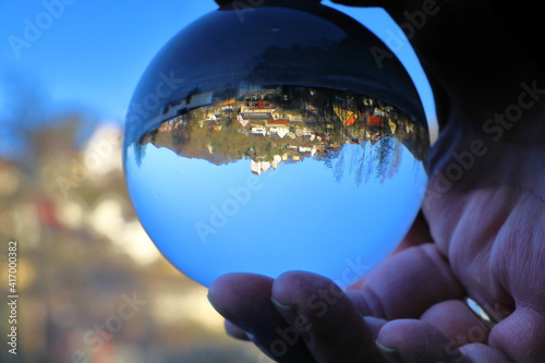 scenic view through a crystal ball of a medieval castle
