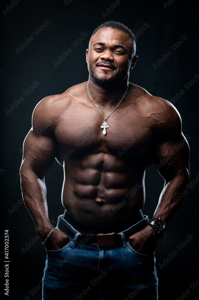 Fototapeta premium Portrait of an athletic African American man topless