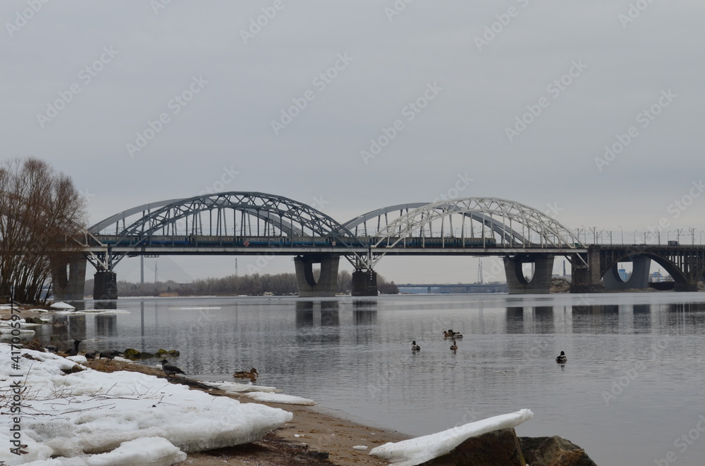 bridge over the river with ducks