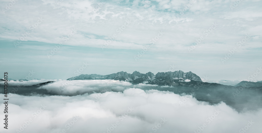 Kitzbühel Alps above the clouds , Austria.