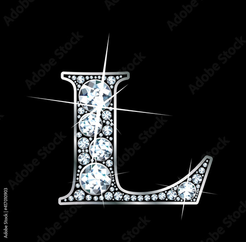 A stunning beautiful "l" set in diamonds and silver.