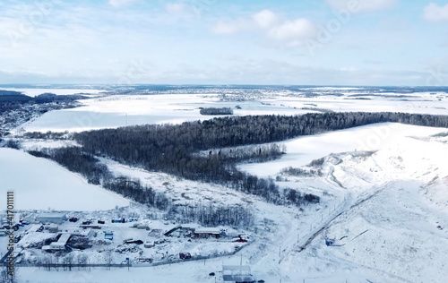 Top view of a snowy winter field © Payllik
