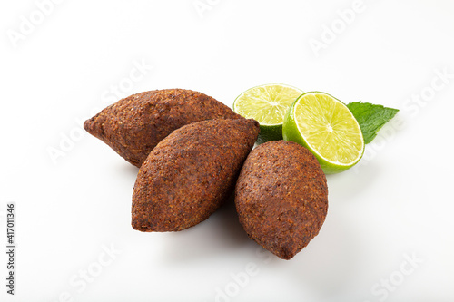 kibbeh traditional Lebanese cuisine food, known in Brazil as Quibe (kibe). Isolated on white background. photo