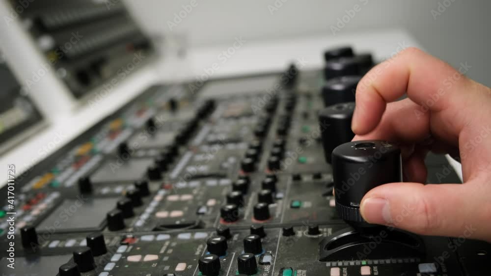Producer Working With Control Desk in TV Studio Producer Working With Control Desk in TV Studio
