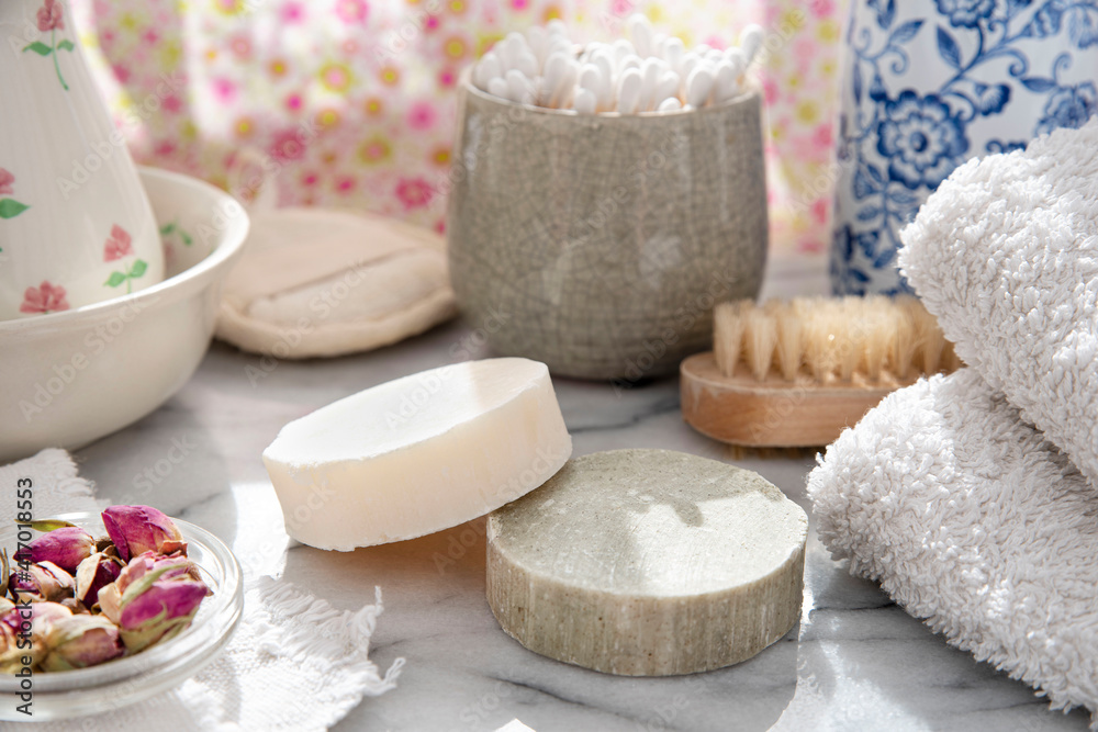 Spotlight on ecological homemade soaps and solid shampoo in the bathroom Spotlight on ecological homemade soaps and solid shampoo in the bathroom