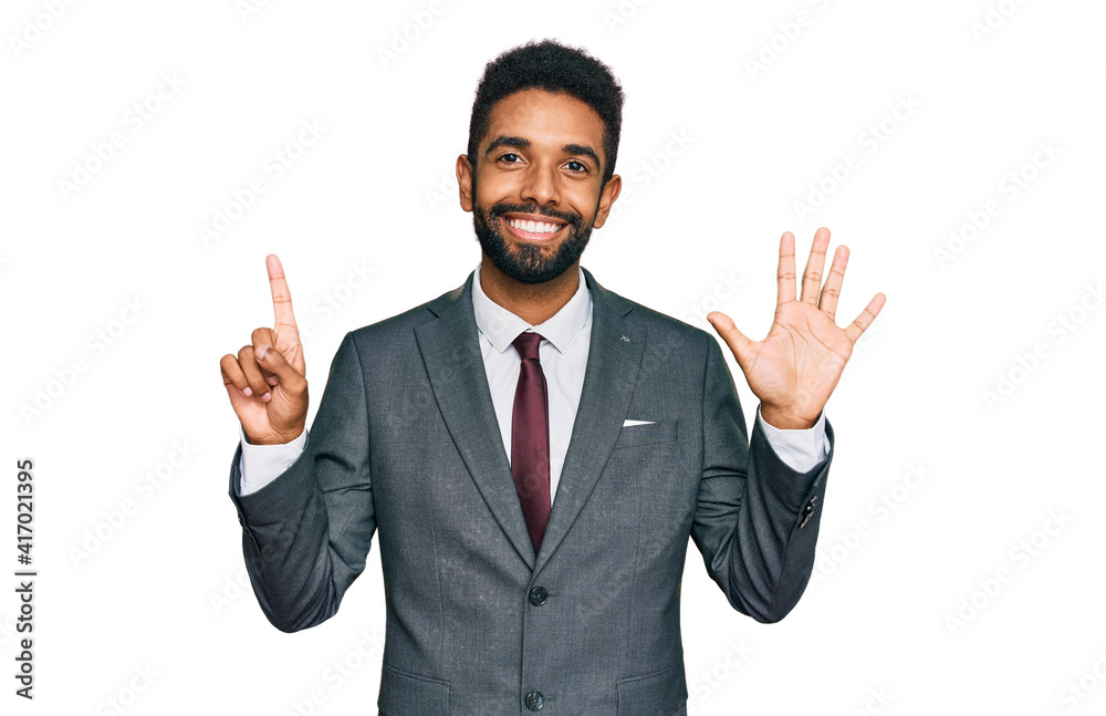 Young african american man wearing business clothes showing and pointing up with fingers number six while smiling confident and happy. Young african american man wearing business clothes showing and pointing up with fingers number six while smiling confident and happy.