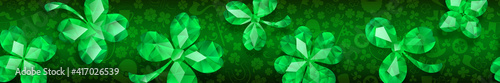 Banner on St. Patrick's Day made of crystal clover leaves and other symbols  in green colors with seamless horizontal repetition